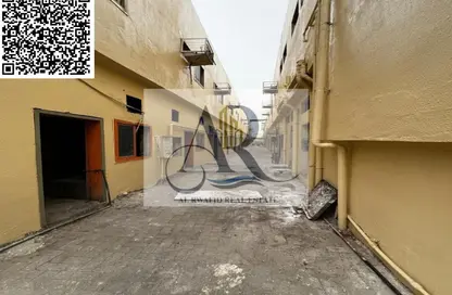 سكن عمال - استوديو - 8 حمامات للايجار في بناية اس جي 10 - المنطقة الصناعية رقم 10 - المنطقة الصناعية بالشارقة - الشارقة