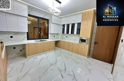 Villa - 4 Bedrooms - 6 Bathrooms for sale in Al Zaheya Gardens - Al Zahya - Ajman
