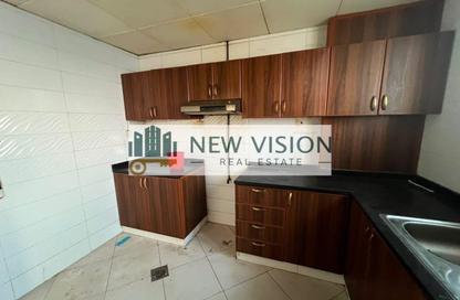 Apartment - 1 Bedroom - 2 Bathrooms for rent in Abu Shagara building - Abu shagara - Sharjah