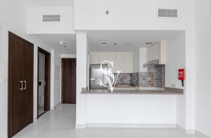 Apartment - 1 - 2 for sale in Rabdan Building - Motor City - Dubai