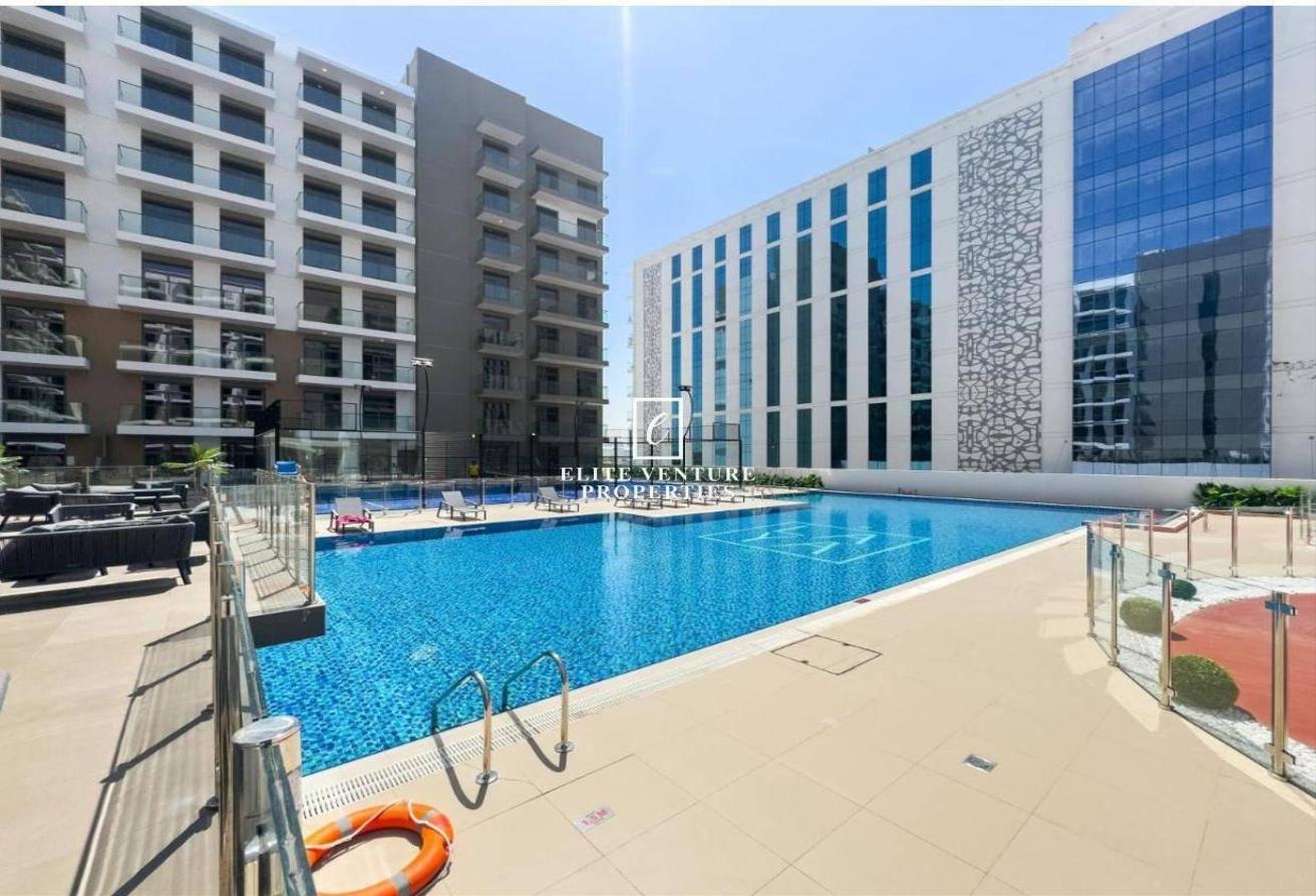 MODERN 1-BHK | FULLY FURNISHED | COMMUNITY VIEW photo 12