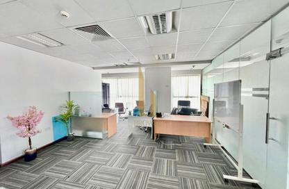 Office Space - 1 Bedroom - 1 Bathroom for rent in Indigo Optima - Indigo Towers - International City - Dubai