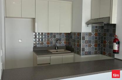 Apartment - 1 - 2 for rent in Rabdan Building - Motor City - Dubai