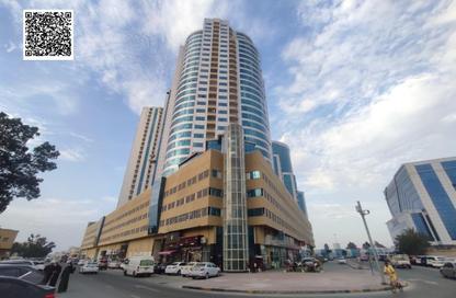 شقة - غرفة نوم - 2 حمامات للايجار في أورينت تاور 1 - أورينت تاور - البستان - عجمان