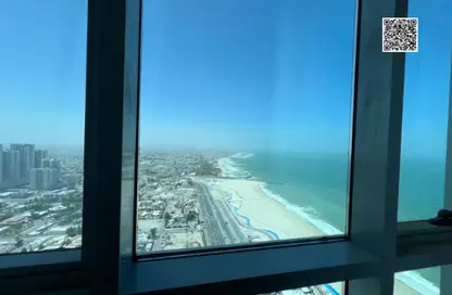 Apartment - 1 Bedroom - 2 Bathrooms for sale in Corniche Tower - Ajman Corniche Road - Ajman