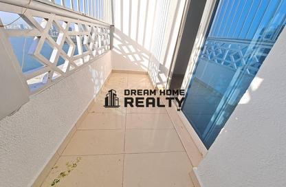 Apartment - 1 - 2 for rent in Ameer Bu Khamseen Tower - Al Majaz 3 - Al Majaz - Sharjah