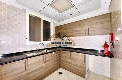Apartment - 1 Bedroom - 2 Bathrooms for rent in Liwa Residence - Dubai Silicon Oasis - Dubai