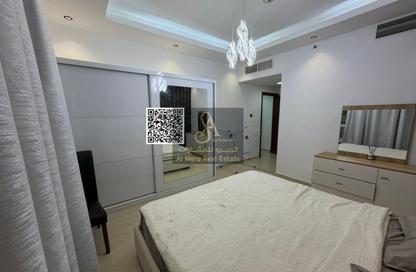 Apartment - 1 Bedroom - 2 Bathrooms for sale in Orient Tower 1 - Orient Towers - Al Bustan - Ajman