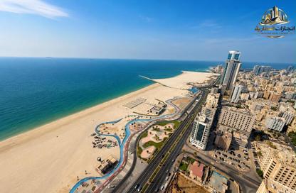 Apartment - 2 Bedrooms - 3 Bathrooms for sale in Corniche Tower - Ajman Corniche Road - Ajman