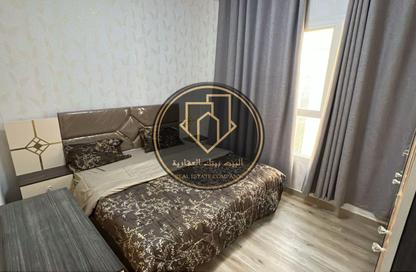 Apartment - 2 Bedrooms - 2 Bathrooms for sale in Mandarin Towers - Garden City - Ajman
