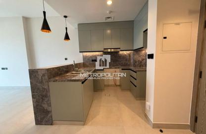 Apartment - 1 - 1 for sale in Golf Gate - Damac Hills - Dubai