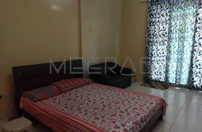 Apartment - 1 Bathroom for rent in Building IC1-EMR-05 - Emirates Cluster - International City - Dubai