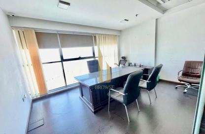 Office Space - Studio - 1 Bathroom for rent in Indigo Optima - Indigo Towers - International City - Dubai
