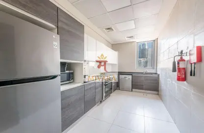 Apartment - 1 Bedroom - 2 Bathrooms for rent in Bahwan Tower Downtown - Downtown Dubai - Dubai