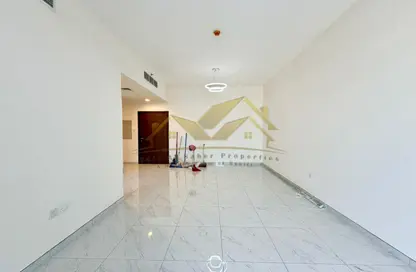 شقة - 2 غرف نوم - 2 حمامات للايجار في برج تيتانيوم - الكرامة - دبي