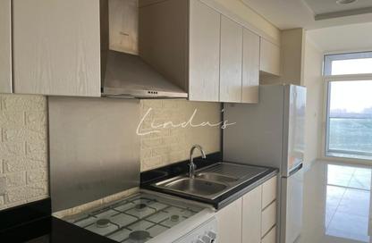 Apartment - Studio - 1 for rent in Carson A - Carson - Damac Hills - Dubai