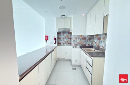 Apartment - 1 Bedroom - 2 Bathrooms for rent in Rabdan Building - Motor City - Dubai