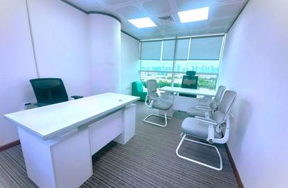 Business Centre - Studio - 2 Bathrooms for rent in Junaibi Tower - Al Danah - Abu Dhabi