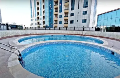 Apartment - 1 Bedroom - 2 Bathrooms for sale in Orient Towers - Al Bustan - Ajman