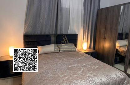 Apartment - 1 Bedroom - 2 Bathrooms for sale in Orient Tower 1 - Orient Towers - Al Bustan - Ajman
