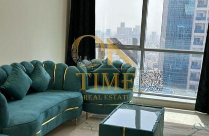 Apartment - 1 Bedroom - 2 Bathrooms for rent in Corniche Tower - Ajman Corniche Road - Ajman