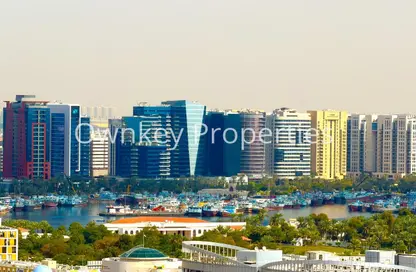 شقة - 2 غرف نوم - 3 حمامات للايجار في برج تيتانيوم - الكرامة - دبي