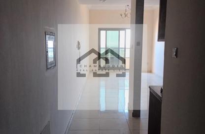 Apartment - 1 - 2 for sale in Paradise Lakes Towers - Emirates City - Ajman