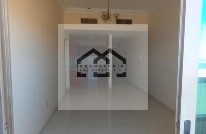 Apartment - 1 - 2 for sale in Paradise Lakes Towers - Emirates City - Ajman