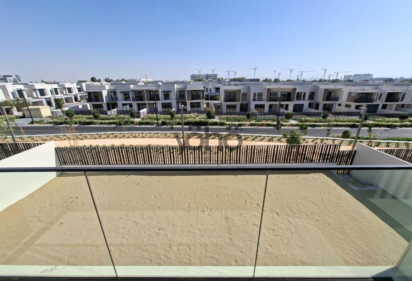 Modern 5BR Villa | Private Plot | Community Views photo 9