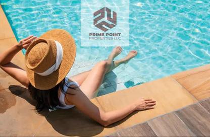 Apartment - 1 - 2 for sale in Izel by Zoya - Dubai Land Residence Complex - Dubai