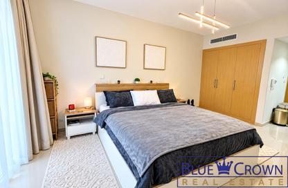 Apartment - Studio - 1 for rent in May Residence 3 - May Residence - District 10 - Jumeirah Village Circle - Dubai
