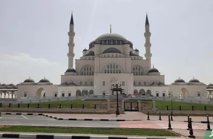 أرض - استوديو للبيع في ضاحية الرويضات - الشارقة