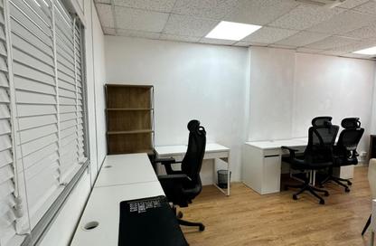 Business Centre - Studio - 2 Bathrooms for rent in Al Kazim Building - Karama Park Area - Al Karama - Dubai