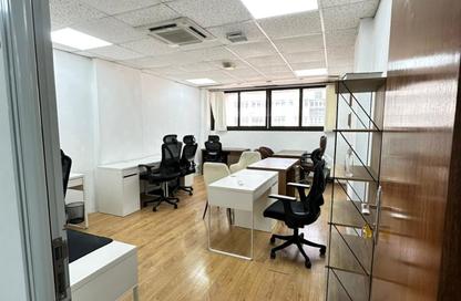 Business Centre - Studio - 2 Bathrooms for rent in Al Kazim Building - Karama Park Area - Al Karama - Dubai
