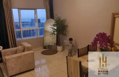 Apartment - 2 Bedrooms - 2 Bathrooms for sale in Orient Towers - Al Bustan - Ajman