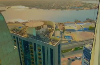 شقة - غرفة نوم - 2 حمامات للبيع في أورينت تاور 1 - أورينت تاور - البستان - عجمان