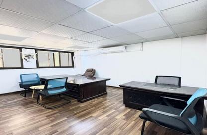 Business Centre - Studio - 2 Bathrooms for rent in Al Kazim Building - Karama Park Area - Al Karama - Dubai