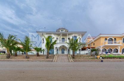 Villa - 5 Bedrooms - 6 Bathrooms for rent in Garden Homes Frond E - Garden Homes - Palm Jumeirah - Dubai