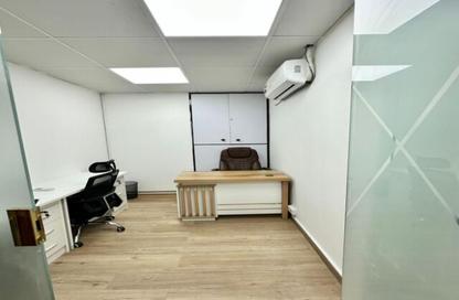 Business Centre - Studio - 2 Bathrooms for rent in Al Kazim Building - Karama Park Area - Al Karama - Dubai