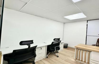 Business Centre - Studio - 2 Bathrooms for rent in Al Kazim Building - Karama Park Area - Al Karama - Dubai