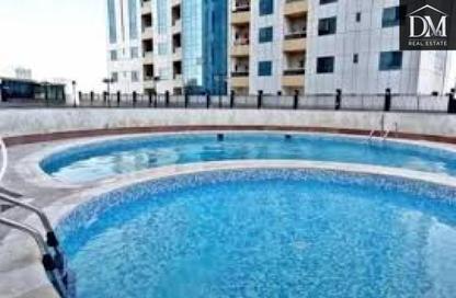 Apartment - 2 Bedrooms - 2 Bathrooms for sale in Orient Towers - Al Bustan - Ajman