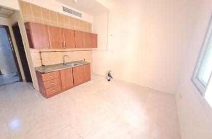 Apartment - Studio - 1 Bathroom for rent in Al Butina 9 Building - Al Butina - Sharjah Apartment - Studio - 1 Bathroom for rent in Al Butina 9 Building - Al Butina - Sharjah