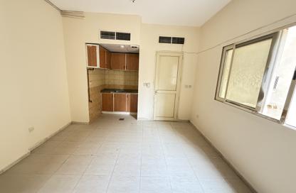 Apartment - Studio - 1 for rent in Bu Tina Building 2 - Bu Tina - Al Sharq - Sharjah