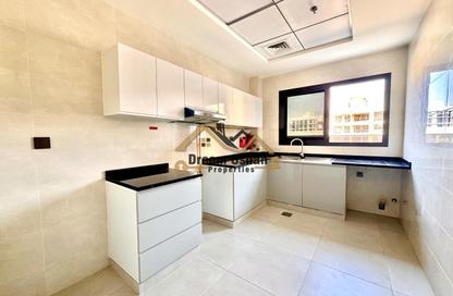 Apartment - 1 - 2 for rent in Al Baraka Residence - International City Phase 2 (Al Warsan 4) - Dubai