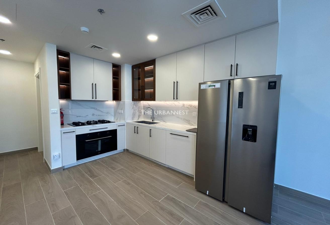 Immaculate 3BR + maids Duplex | Garden & Pool Access photo 4