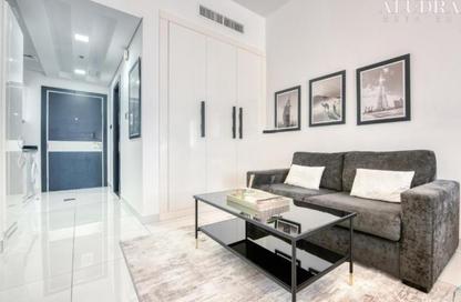 Apartment - Studio - 1 Bathroom for rent in Giovanni Boutique Suites - Dubai Sports City - Dubai