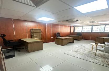 Business Centre - Studio - 2 Bathrooms for rent in Al Kazim Building - Karama Park Area - Al Karama - Dubai