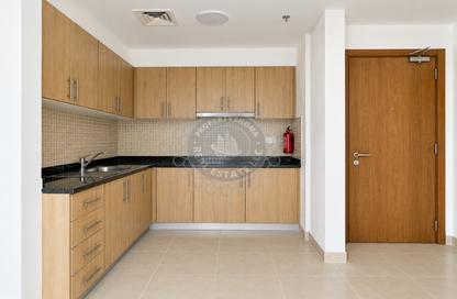 Apartment - 1 - 1 for rent in Mayfair Residency - Business Bay - Dubai