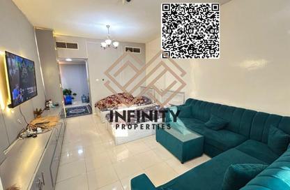 Apartment - 1 Bedroom - 2 Bathrooms for sale in Orient Tower 1 - Orient Towers - Al Bustan - Ajman