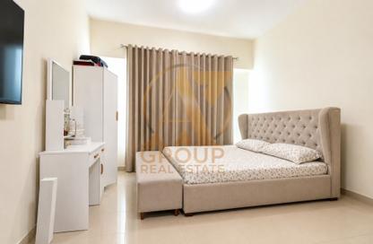 شقة - 1 حمام للبيع في الجوزاء أ - الجوزاء - المدينة العالمية المرحلة 2 - 4 الورسان - الورسان - دبي
